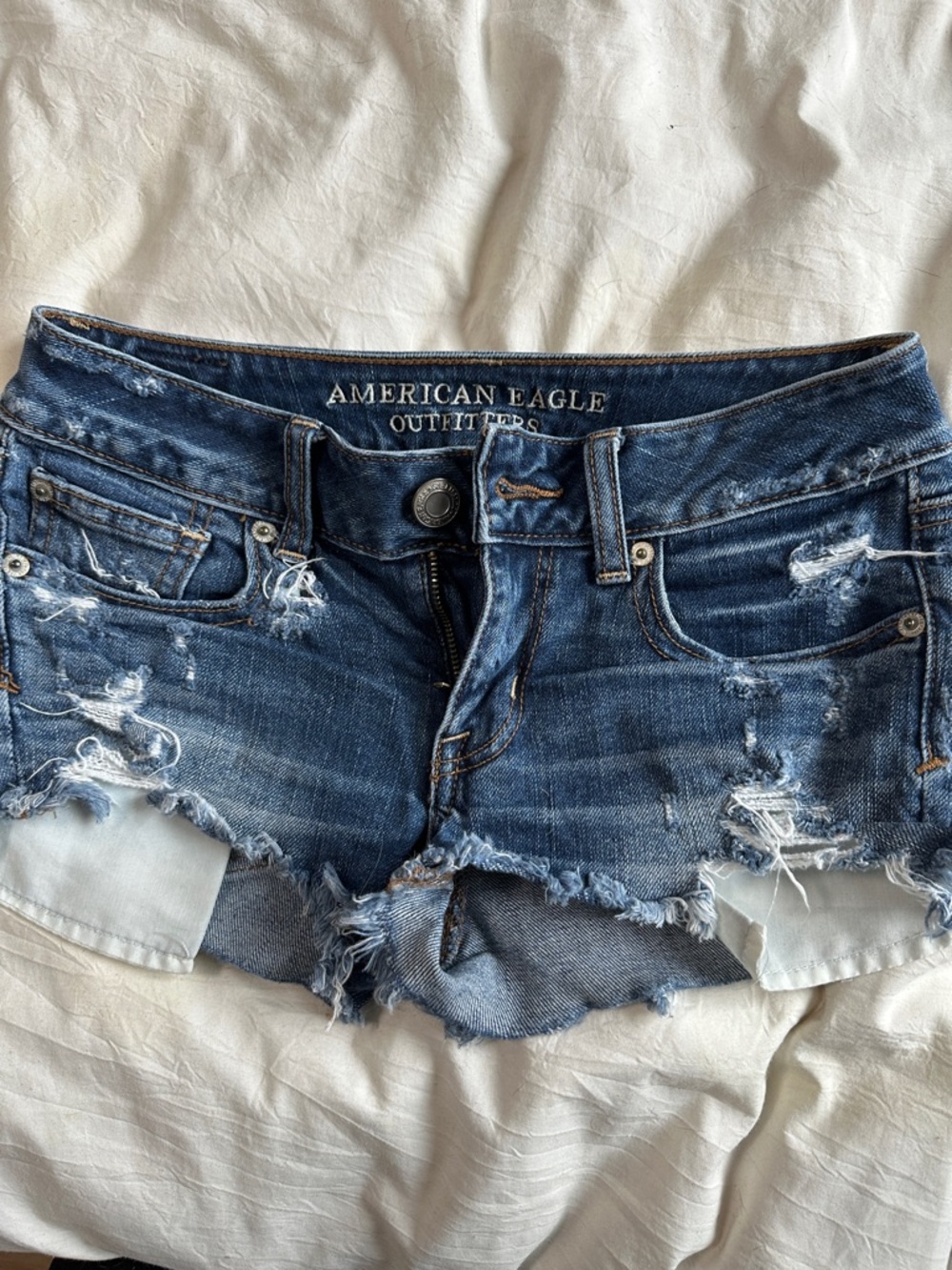 American Eagle Outfitters Ripped Dark Blue Denim Cutoff Shorts